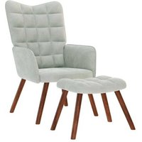 Sillón íntimo con reposapiés de terciopelo